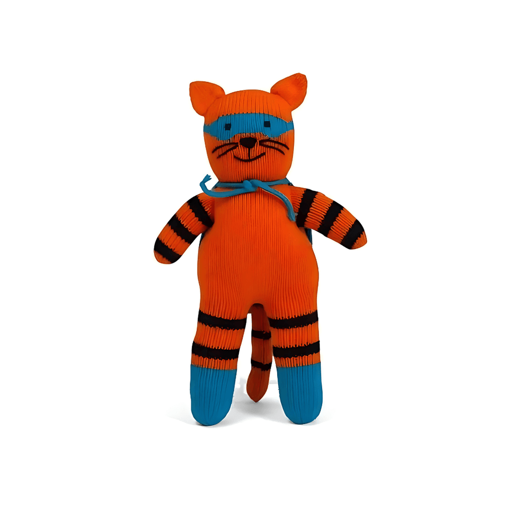 Knitted toy tiger with orange body, black stripes, and blue accents on a white background