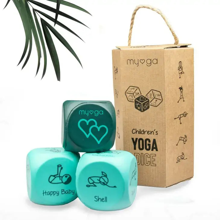 Children's yoga dice with 'myoga' branding and a cardboard box on a white background.