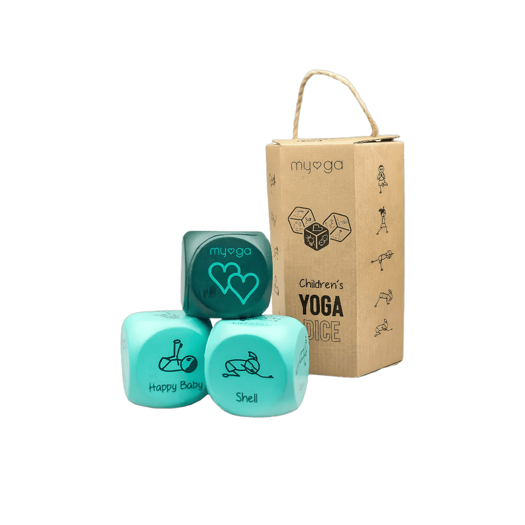 Children's yoga dice set with a cardboard box on a black background
