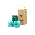 Children's yoga dice set with a cardboard box on a black background