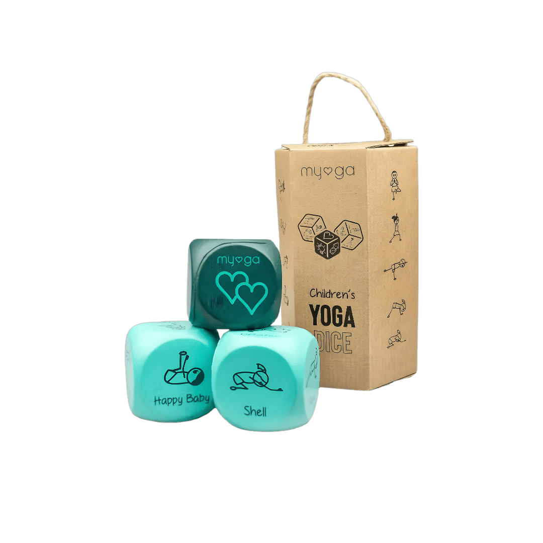 Children's yoga dice set with a cardboard box on a black background