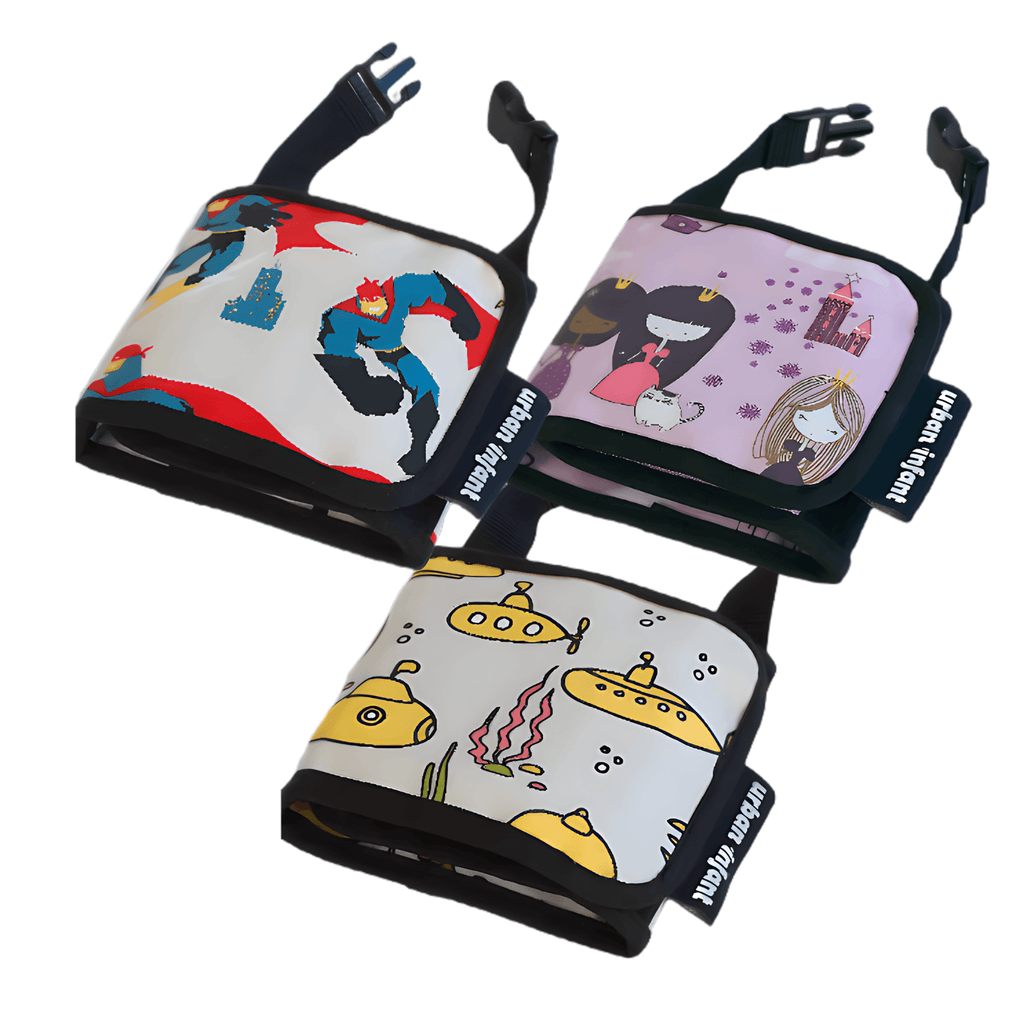 Three cartoon-themed compact crayon wallets with visible branding on a white background