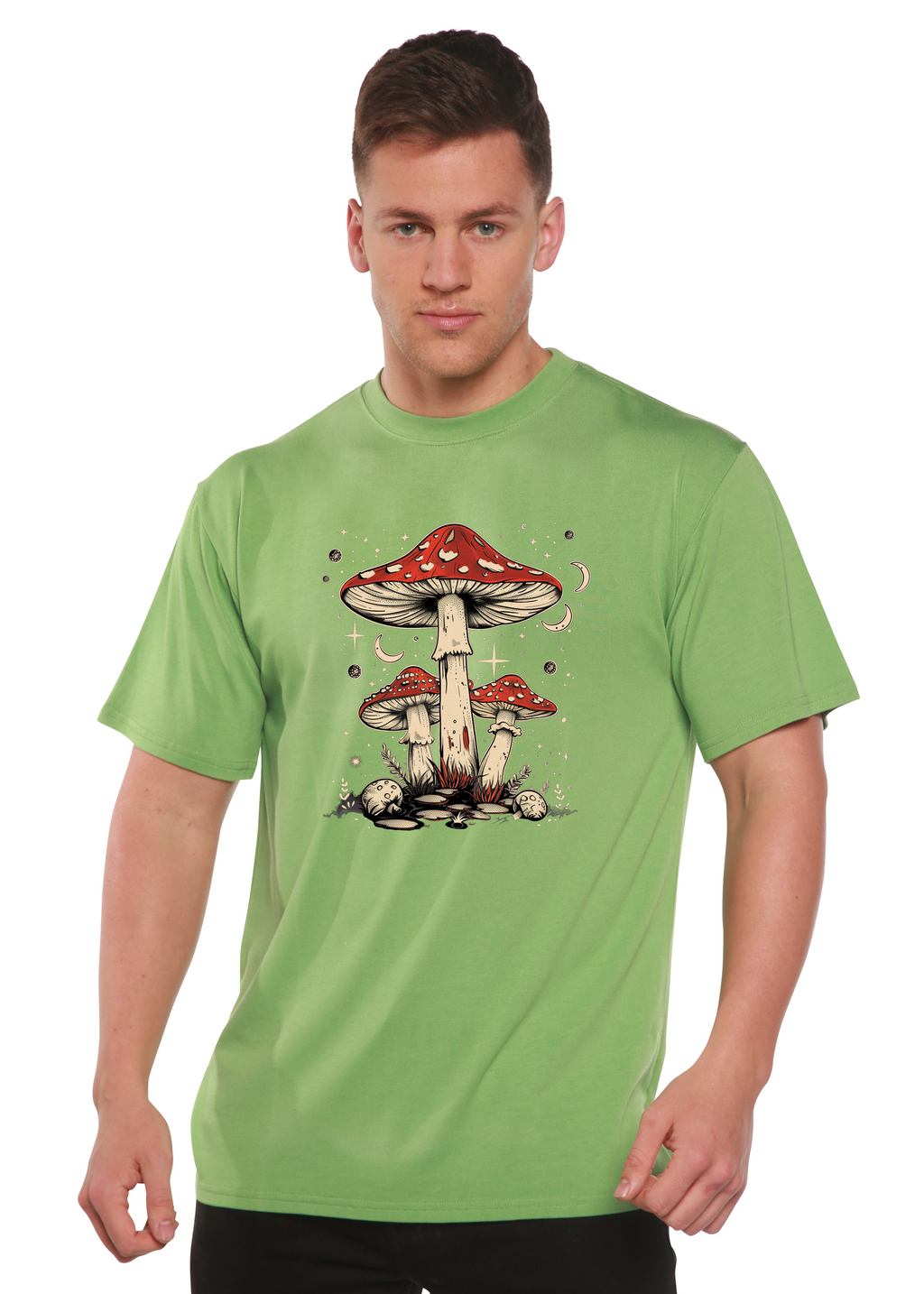 Person wearing a green t-shirt with a mushroom design on a white background