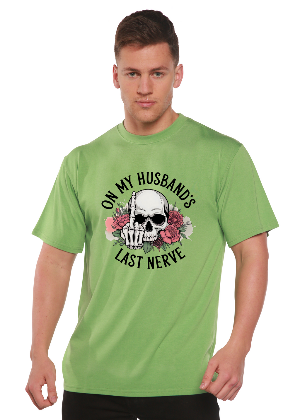 Man wearing a green t-shirt with a skull design and text 'On my husband's last nerve' on a white background