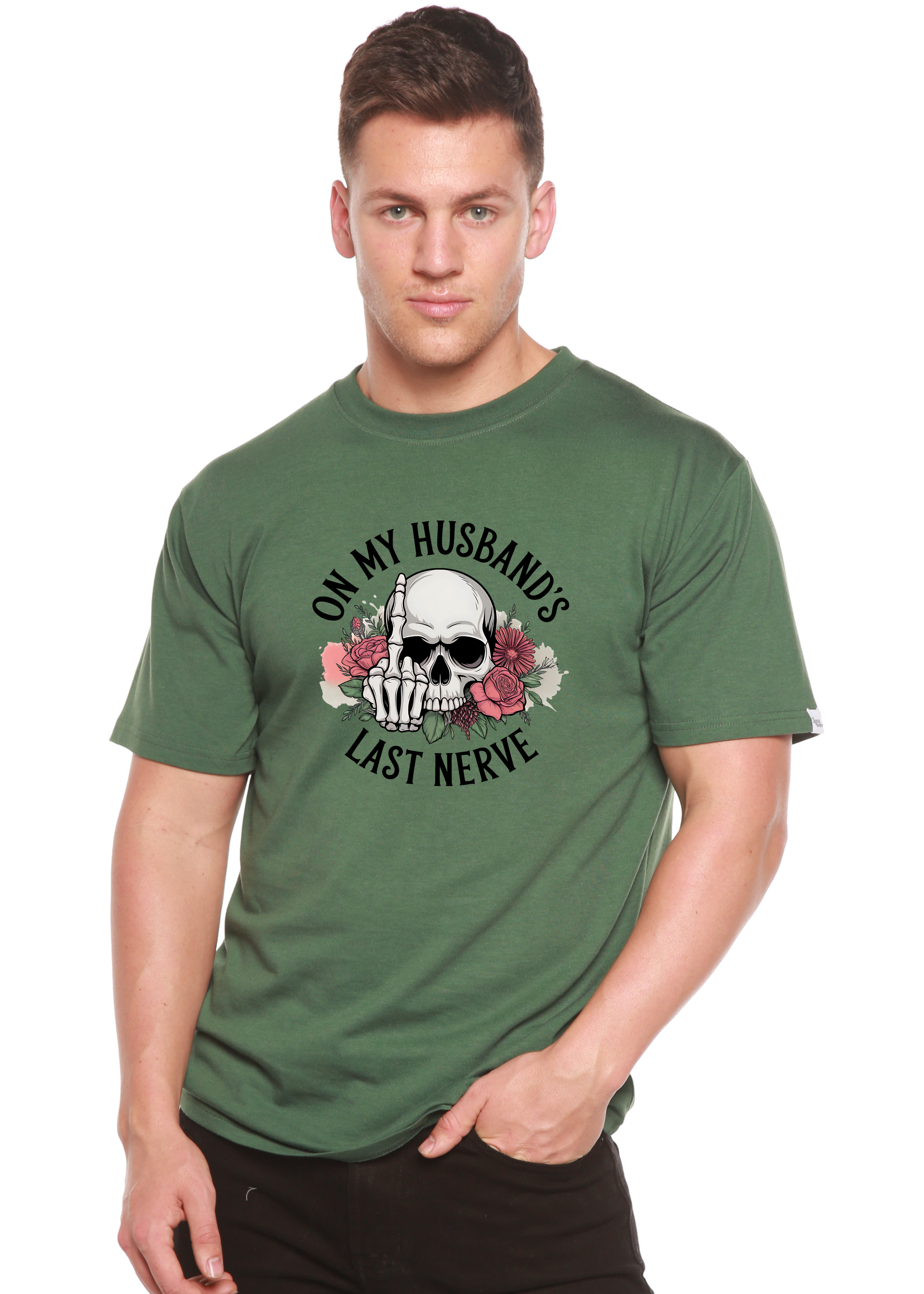 Man wearing a green t-shirt with a skull design and text 'On my husband's last nerve' on a white background