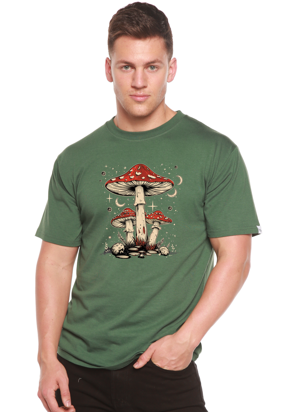 Person wearing a green t-shirt with a mushroom design on a white background