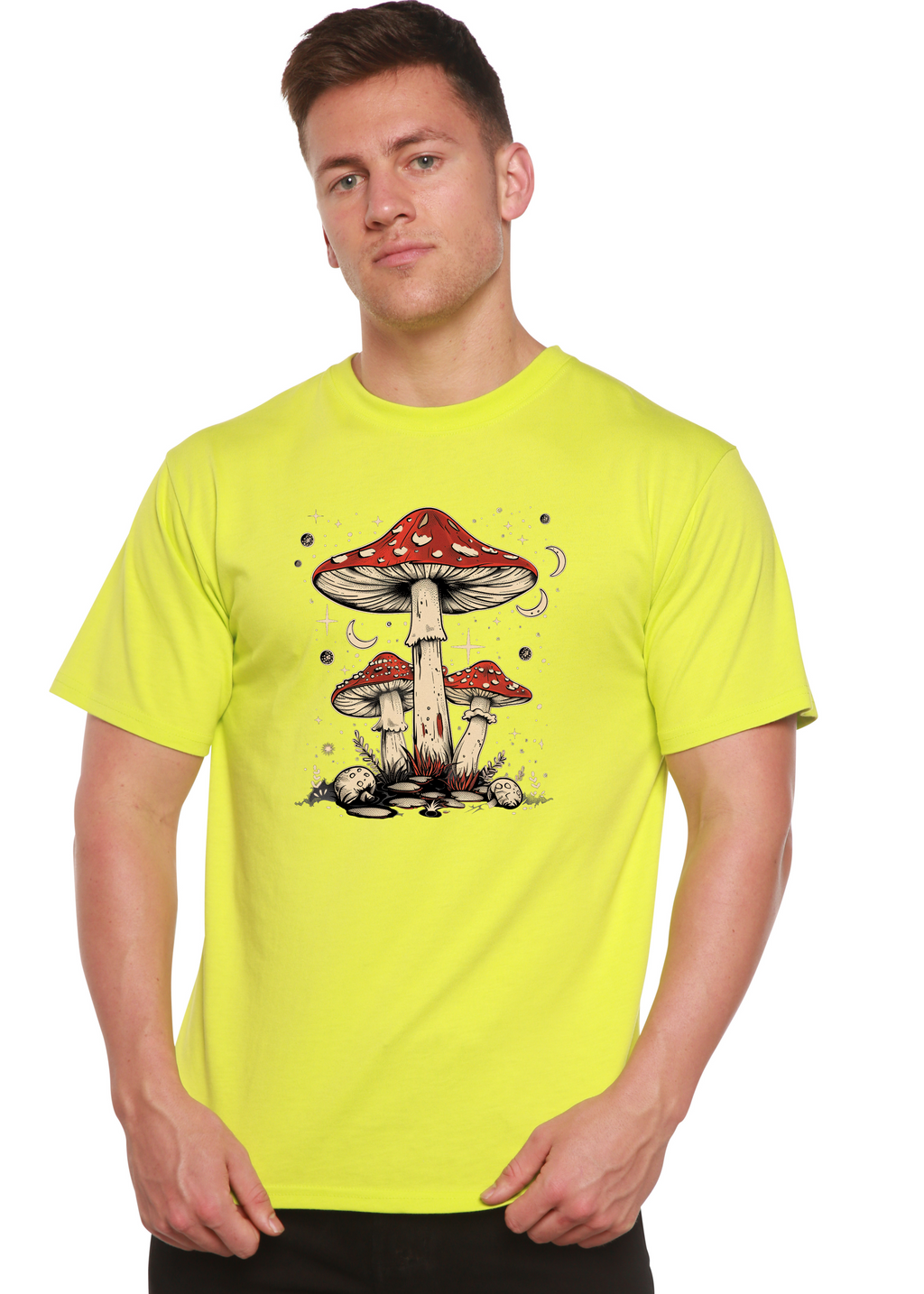 Person wearing a bright yellow t-shirt with a mushroom graphic on a white background