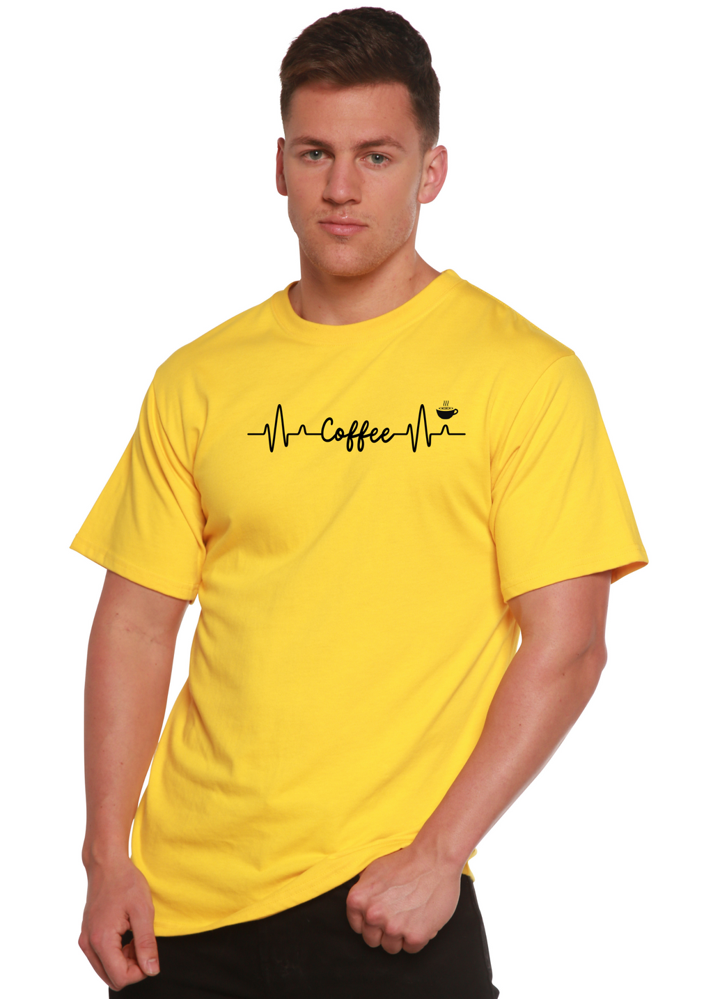 Person wearing a yellow t-shirt with a coffee-themed design on a white background