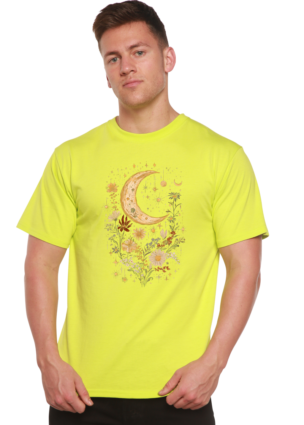 Person wearing a bright yellow t-shirt with a moon and floral design on a white background