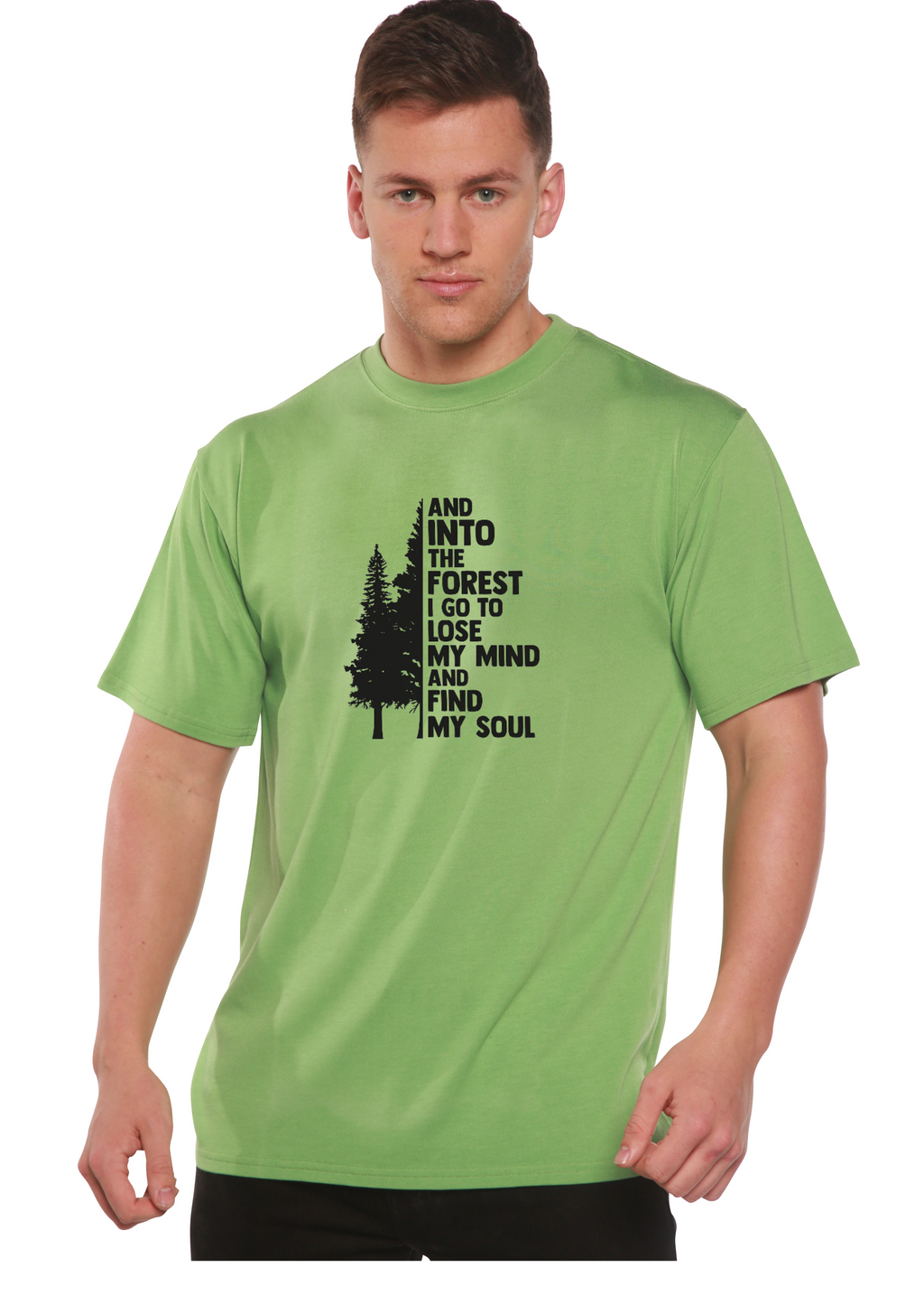 Person wearing a green t-shirt with a black graphic and text on a white background