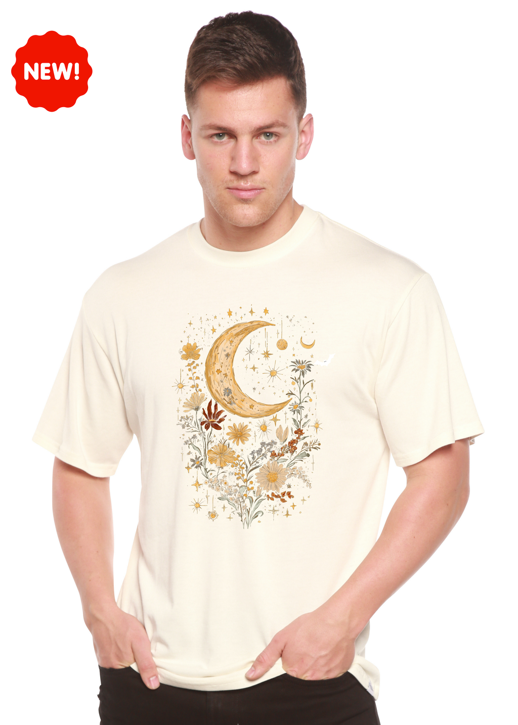 Person wearing a cream t-shirt with a moon and floral design, on a white background.