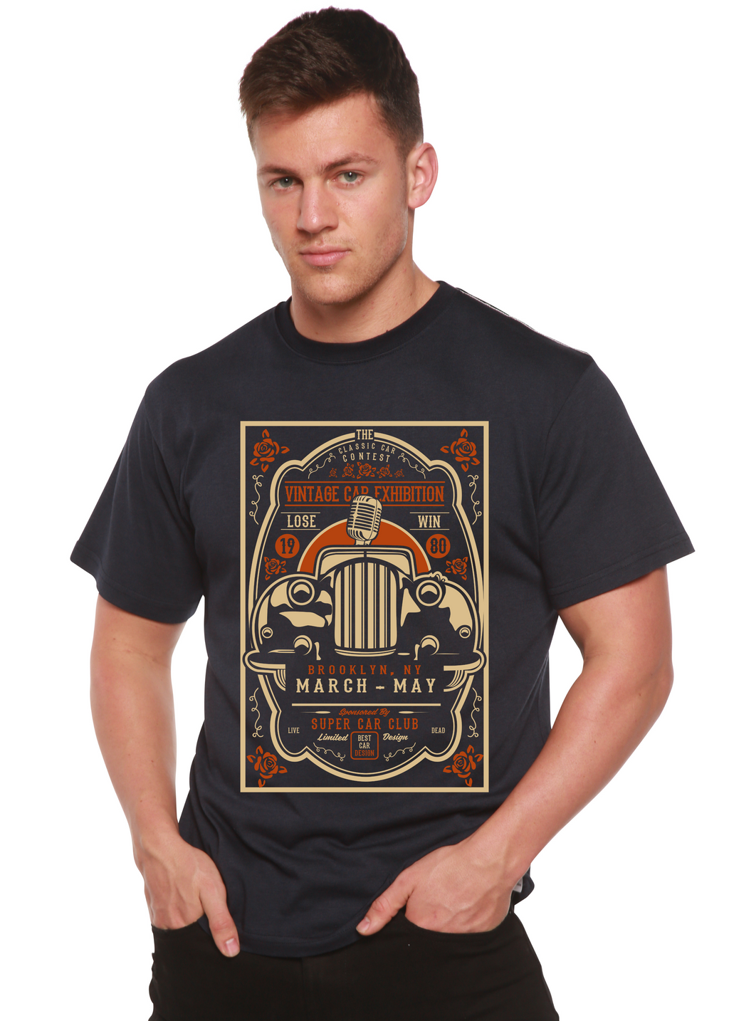 Person wearing a navy bule t-shirt with vintage car design on a white background
