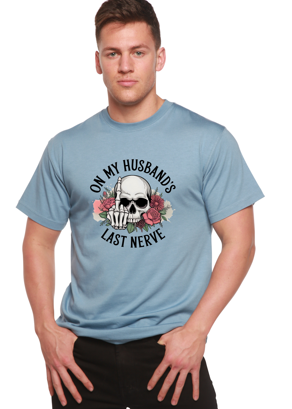 Man wearing a light blue t-shirt with a graphic design and text 'On my husband's last nerve'.