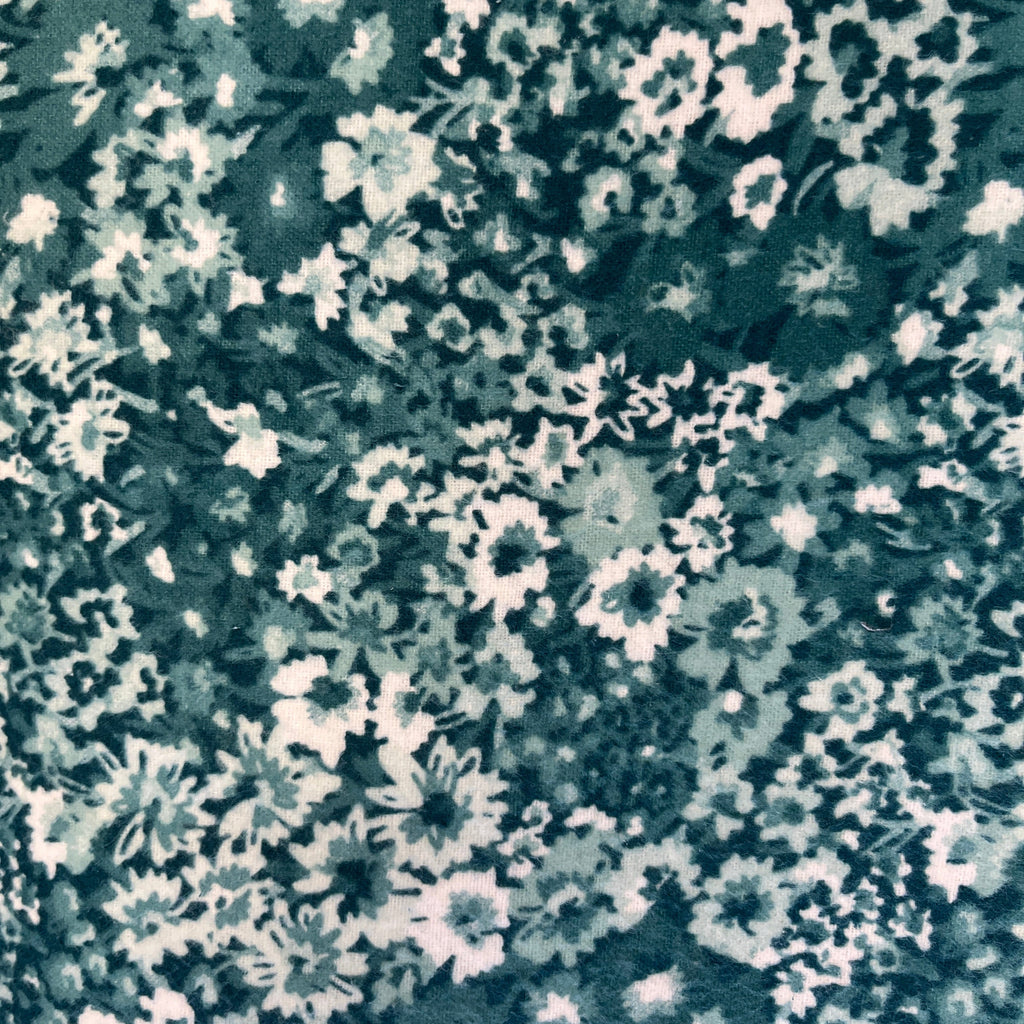 Floral pattern with white flowers on a blue background