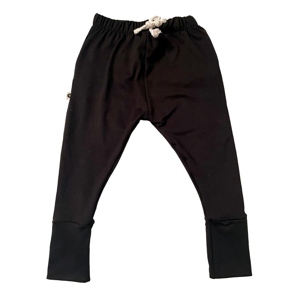 Black bamboo jogger pants on plain background