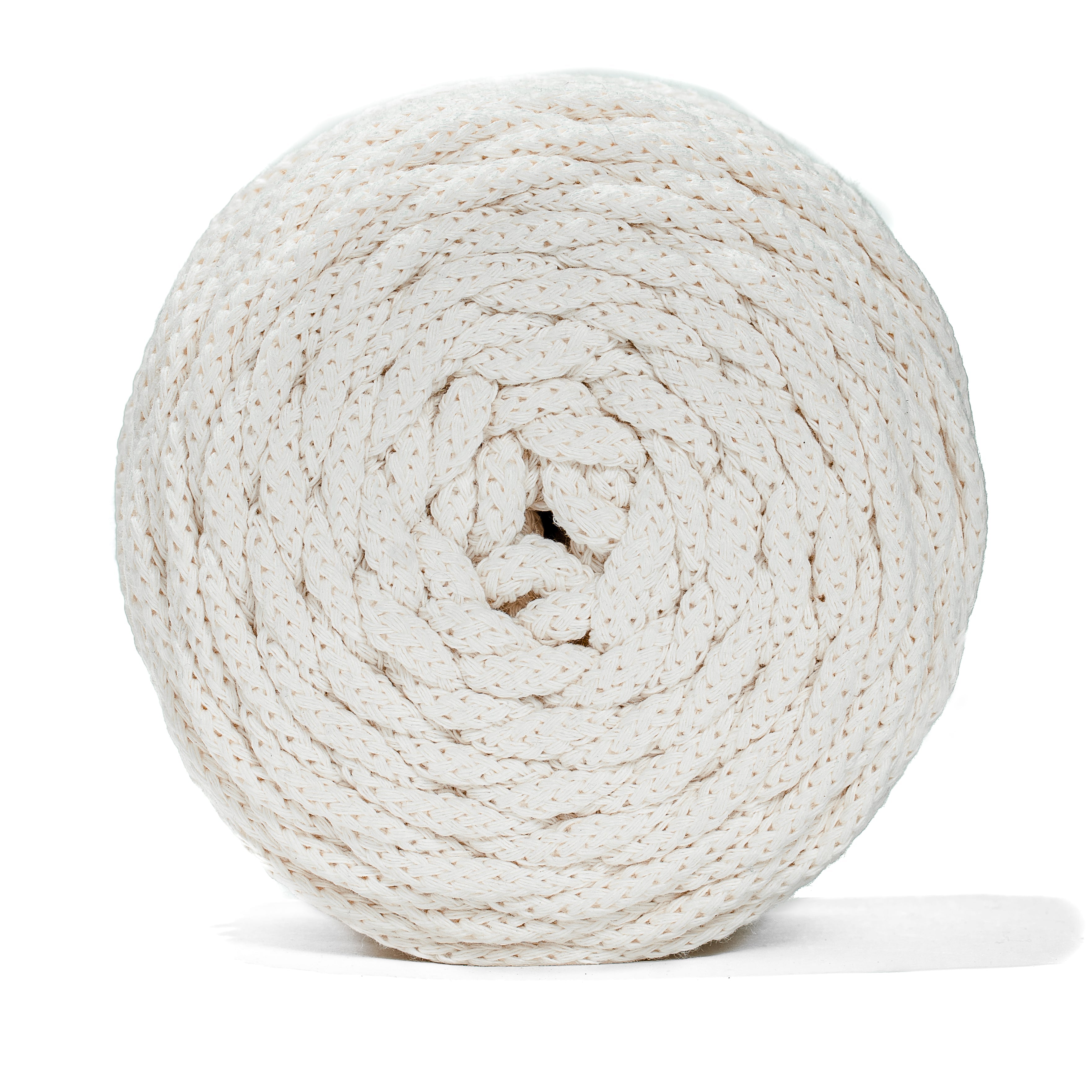 Coiled natural recycled cord on a white background