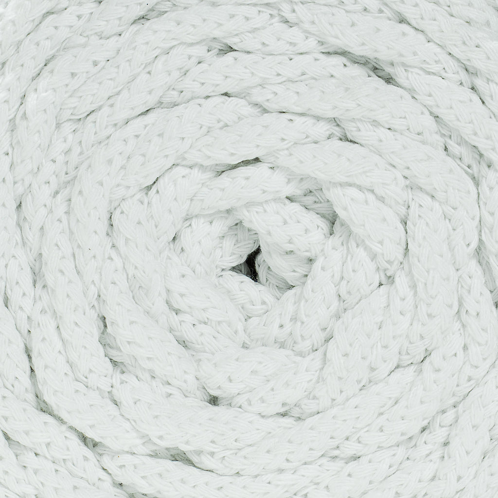 Close-up of a coiled white recycled cotton cord