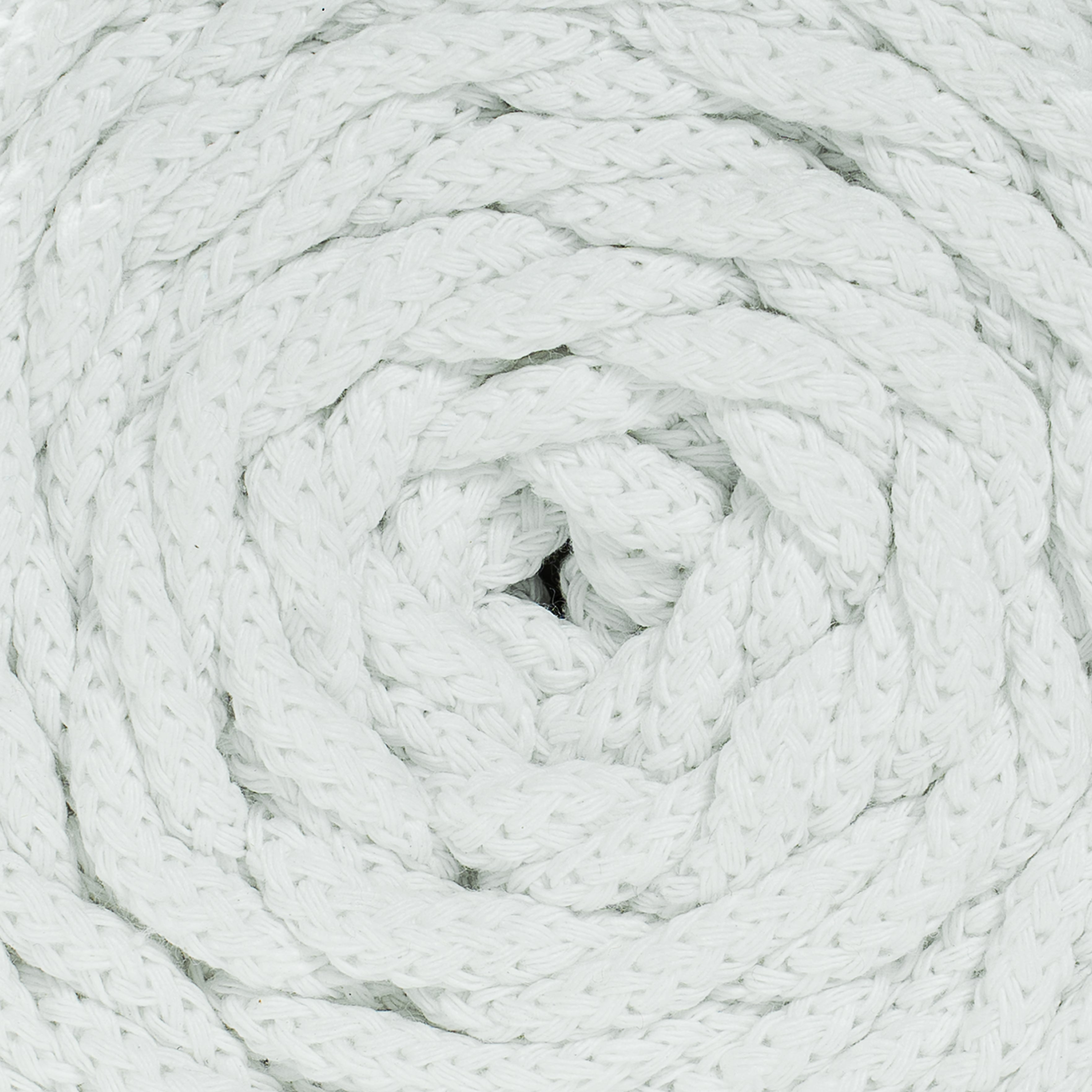 Close-up of a coiled white recycled cotton cord