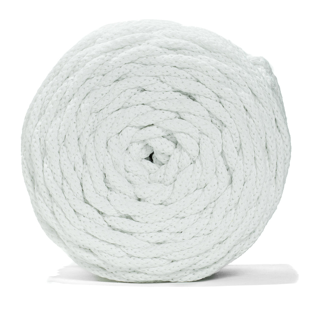 Roll of white recycled cord on a white background