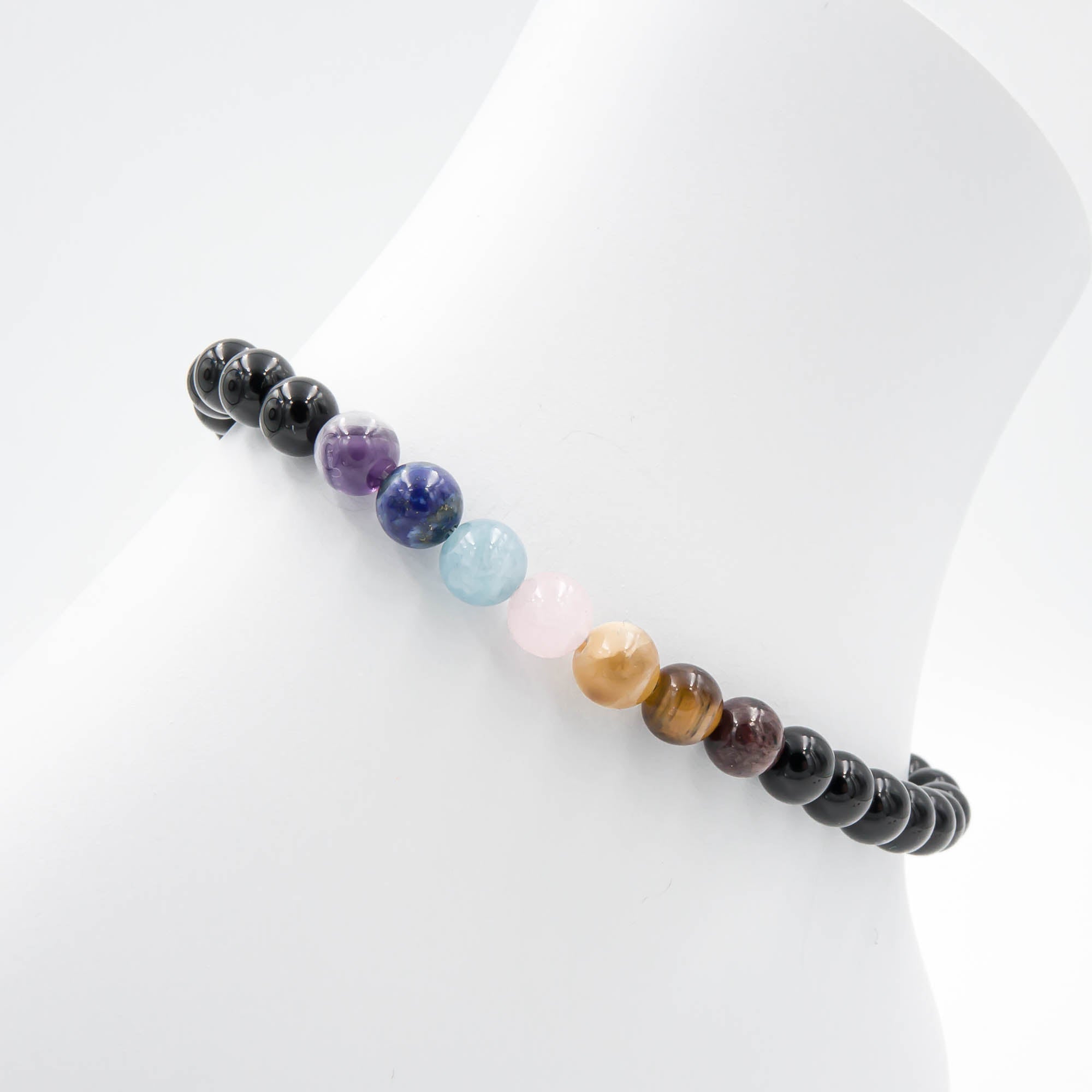 Multicolored beaded bracelet on a white background