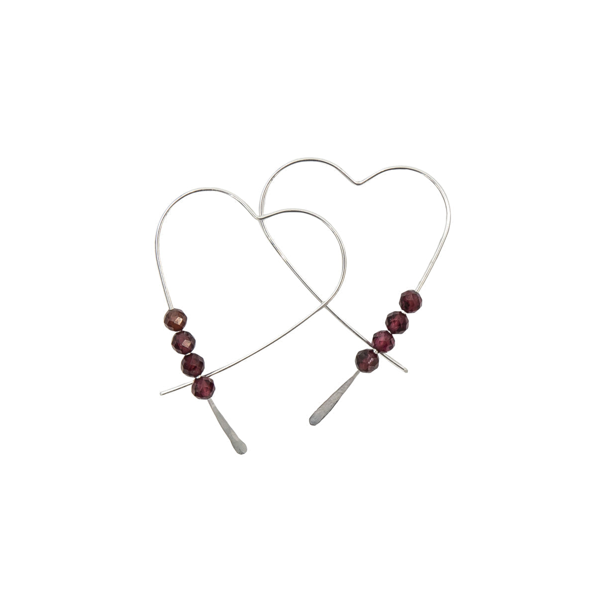 Heart-shaped earrings with red beads on a white background