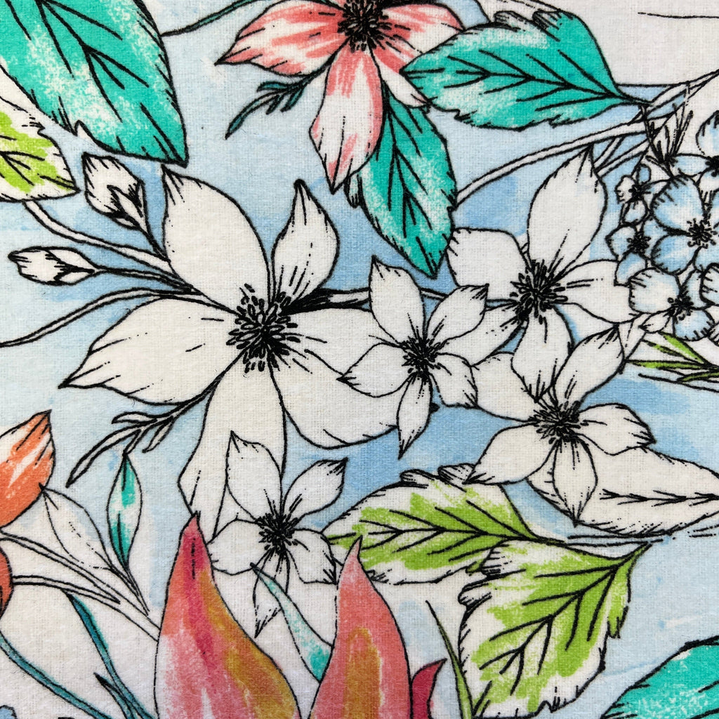 Colorful floral pattern with white flowers on a blue background