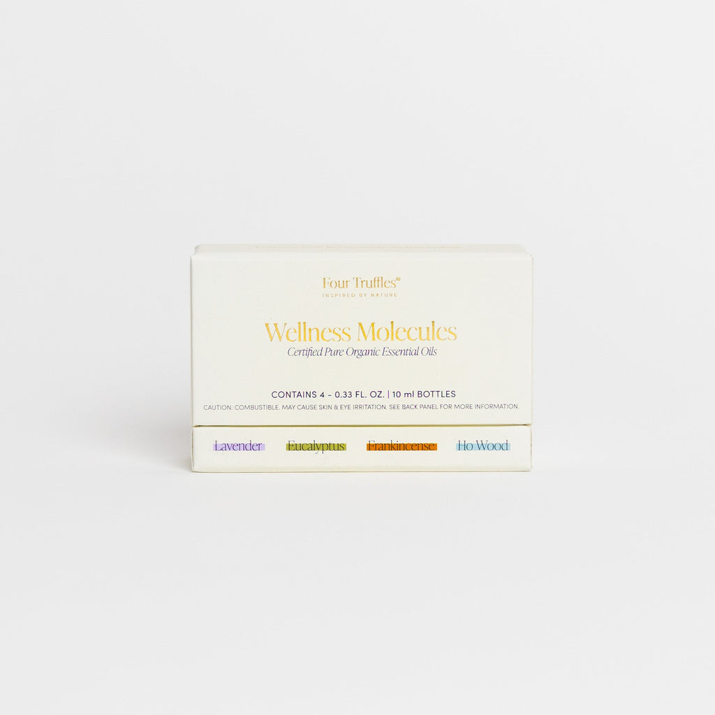 Box of Four Truffles Wellness Molecules essential oils on a white background