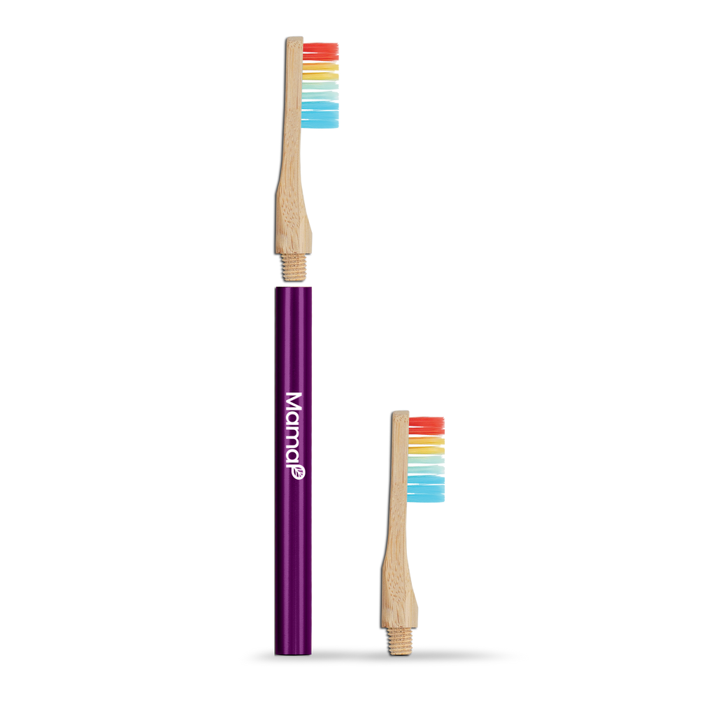 Two bamboo toothbrushes with rainbow bristles and a purple handle on a white background.