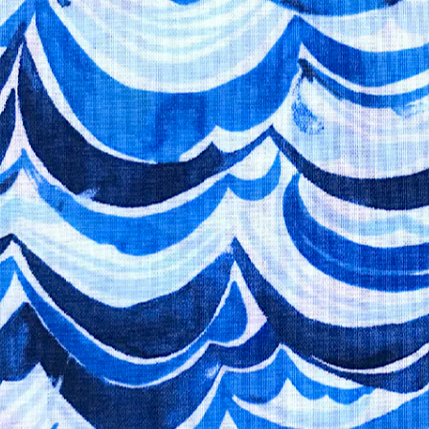 Close-up of blue and white wave pattern fabric texture