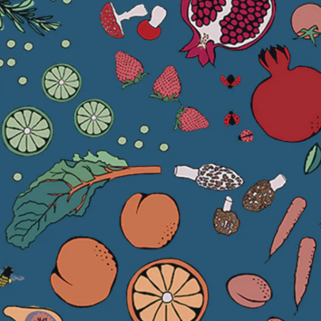 Pattern of fruits, vegetables, and herbs on a blue background