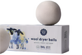 Wool dryer balls with packaging on a white background