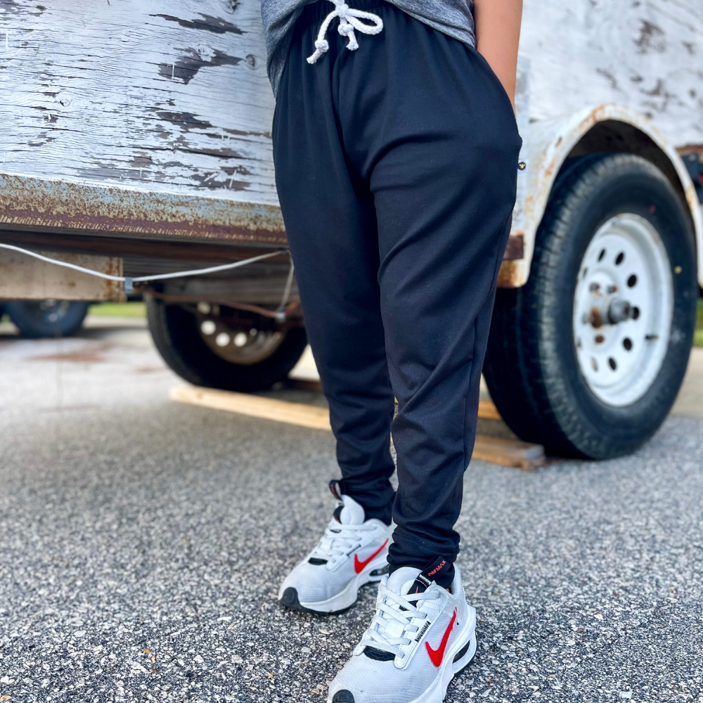 Kid wearing blue bamboo jogger pants