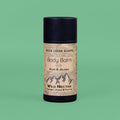 Body balm container with 'Rock Creek Soaps' branding on a green background