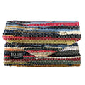 Multicolored beaded clutch with 'Rice Love' branding on a white background