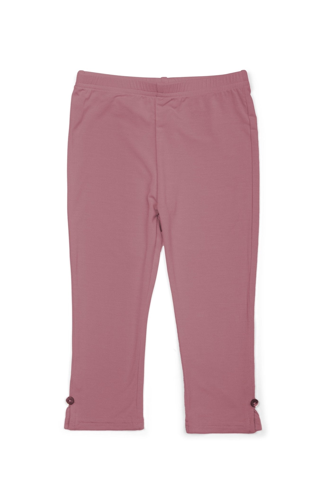 Pink pants with black buttons on a white background