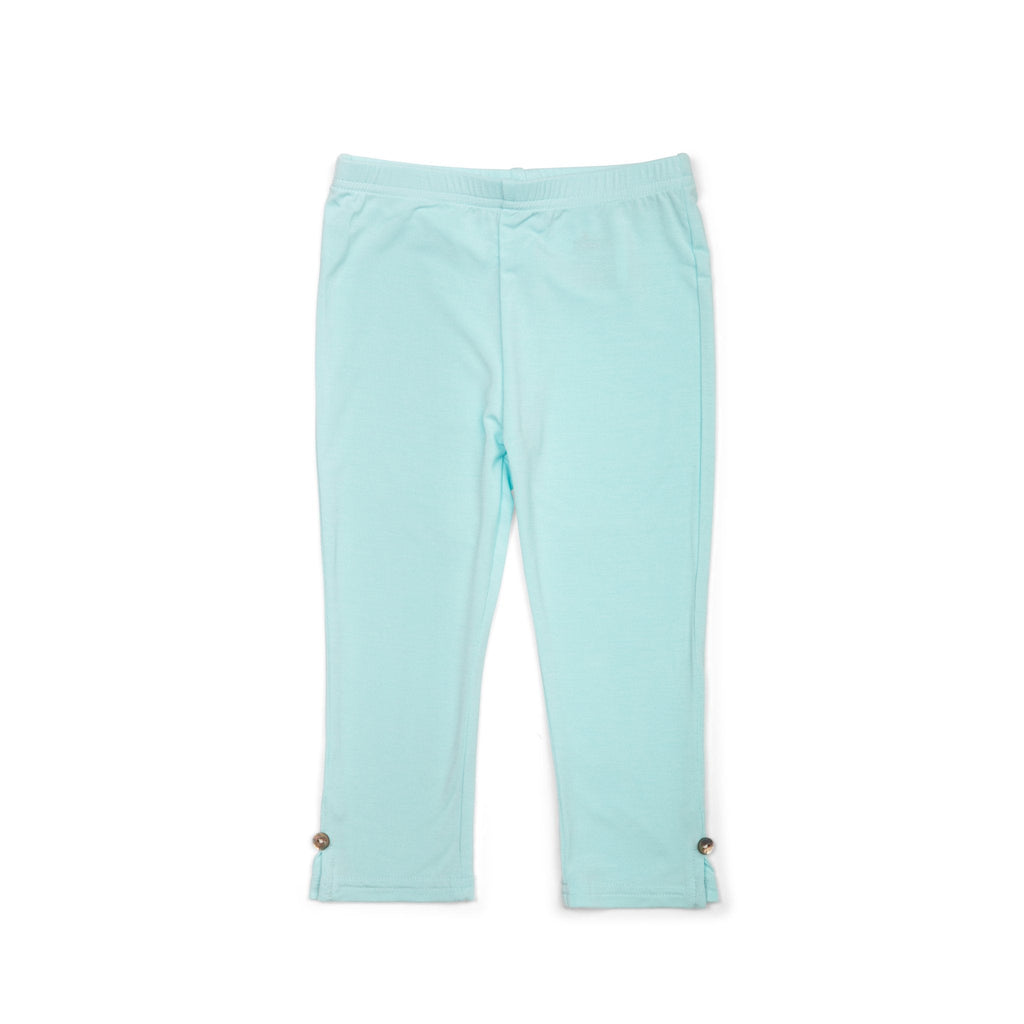Light blue pants with button details on a white background