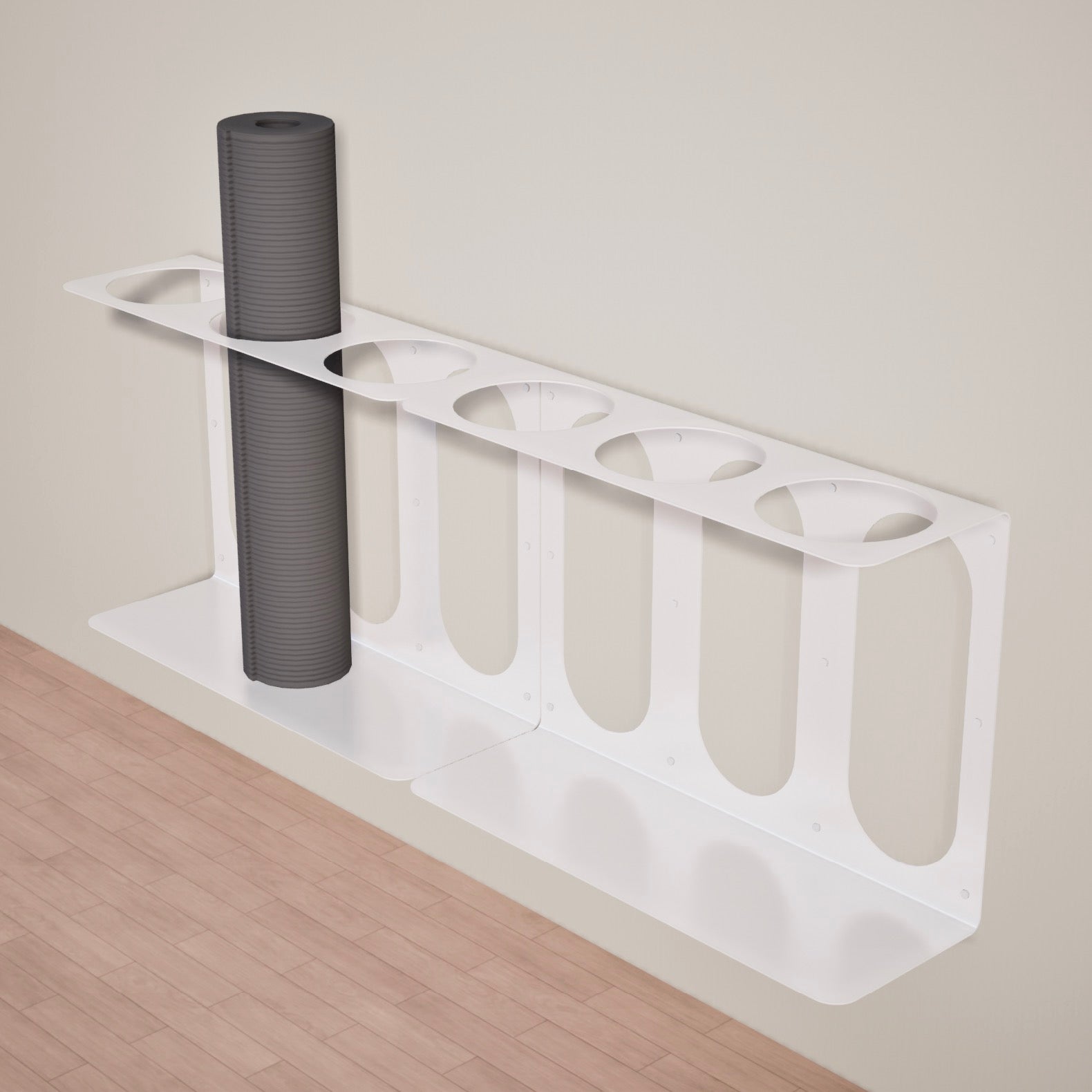 2 white yoga mat stands with 3 places ea. to hold mats attached to a white wall above a wooden floor.