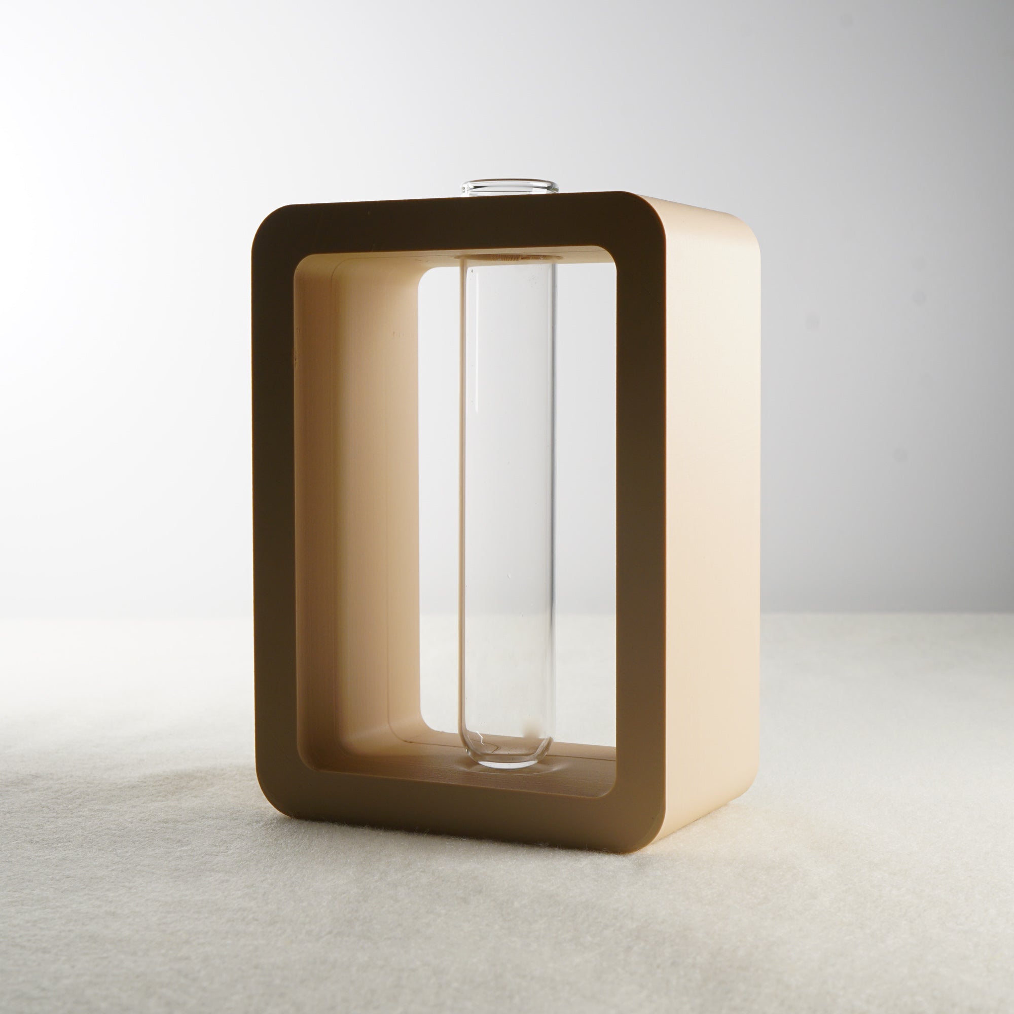 Rectangular, brown vase on a light gray background