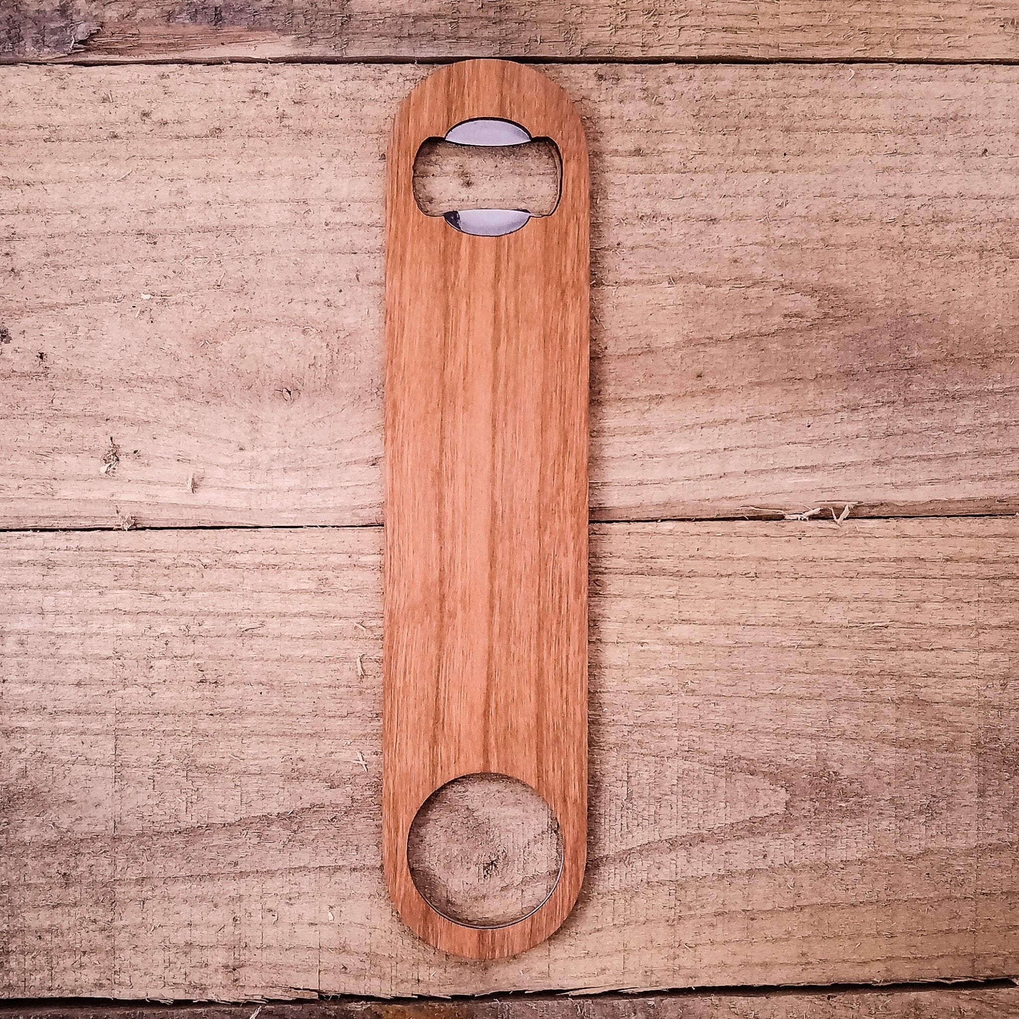 Wooden bottle opener on a wooden surface