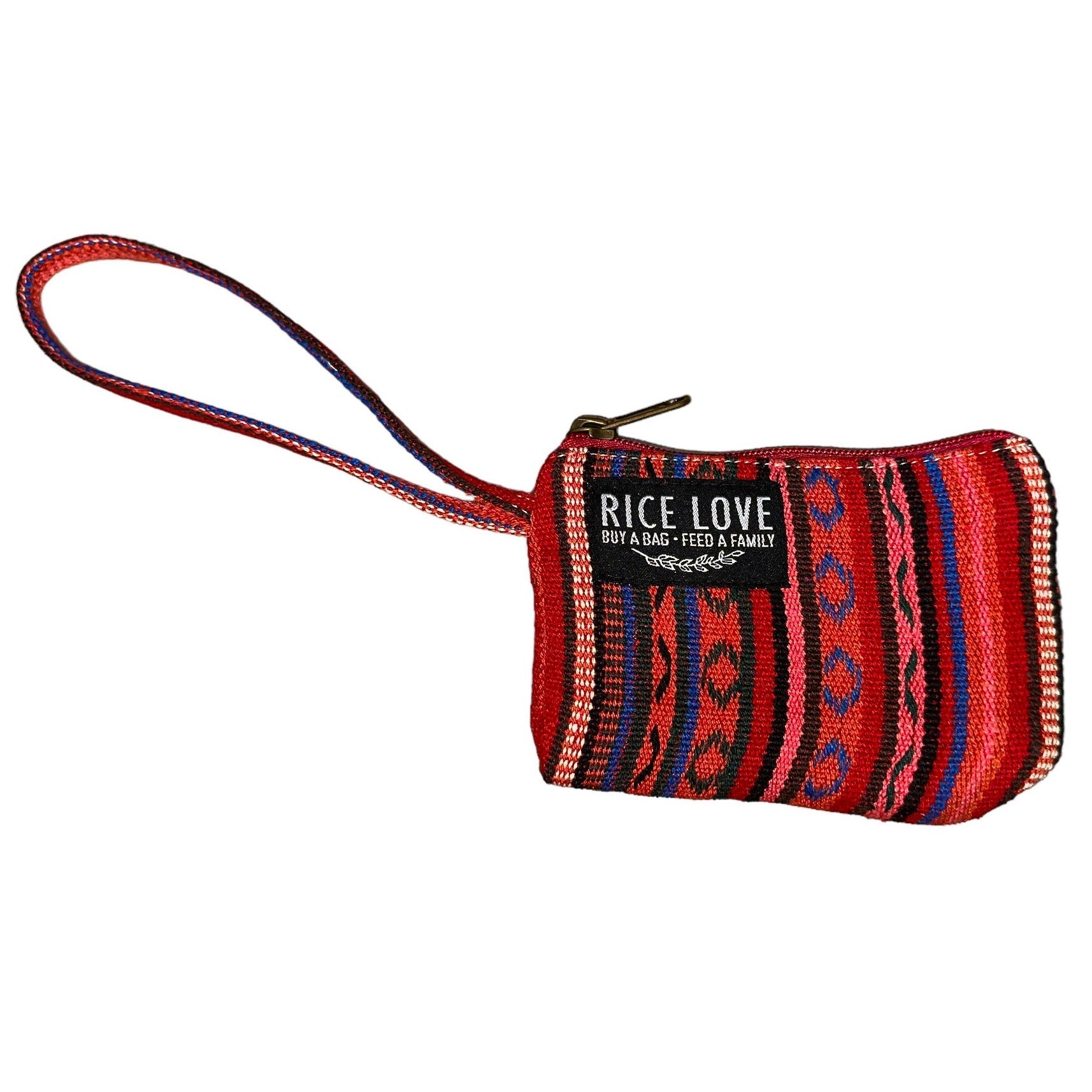 Small red and blue patterned wallet with a strap on a white background