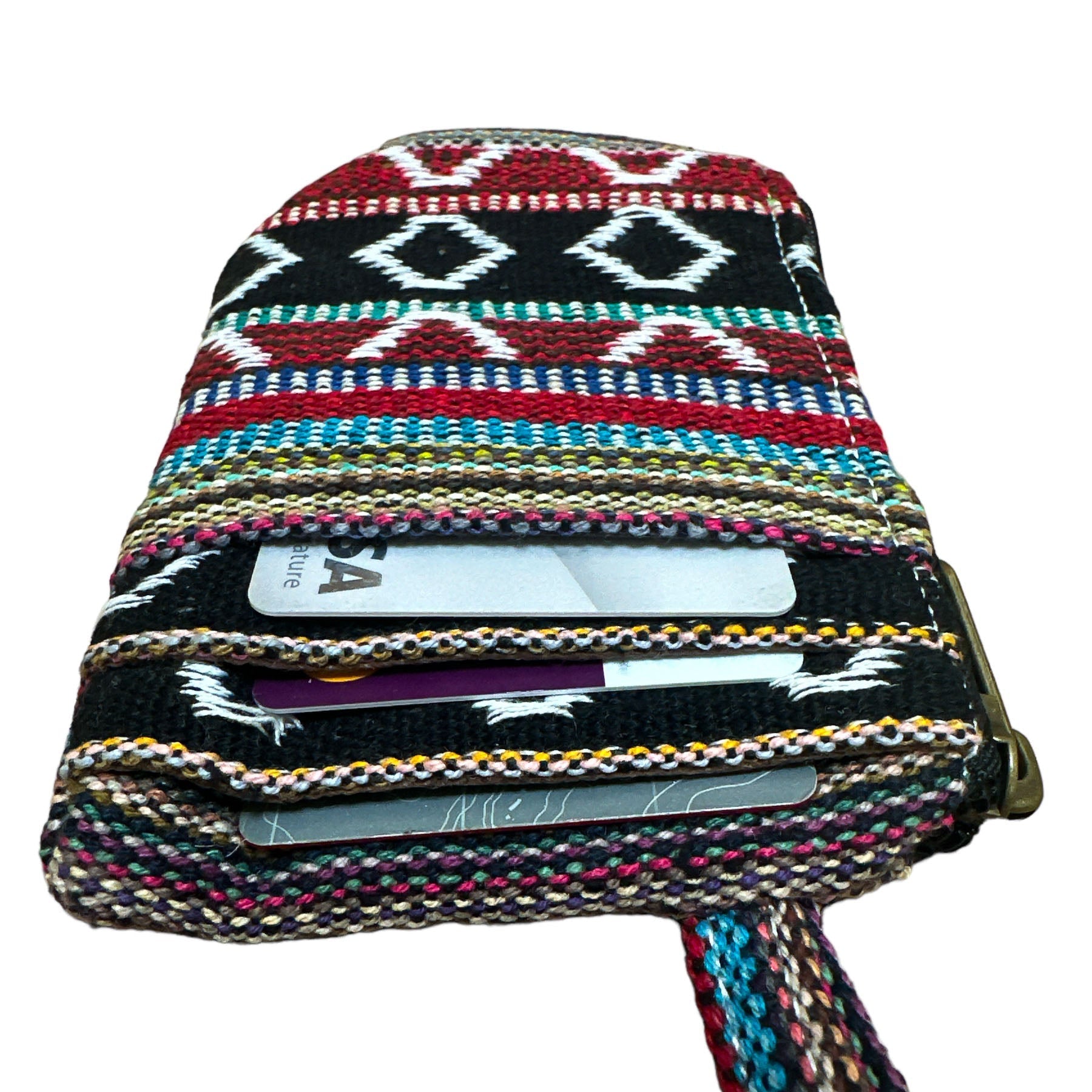 Multicolored woven wallet with strap and zipper with card slots on a white background