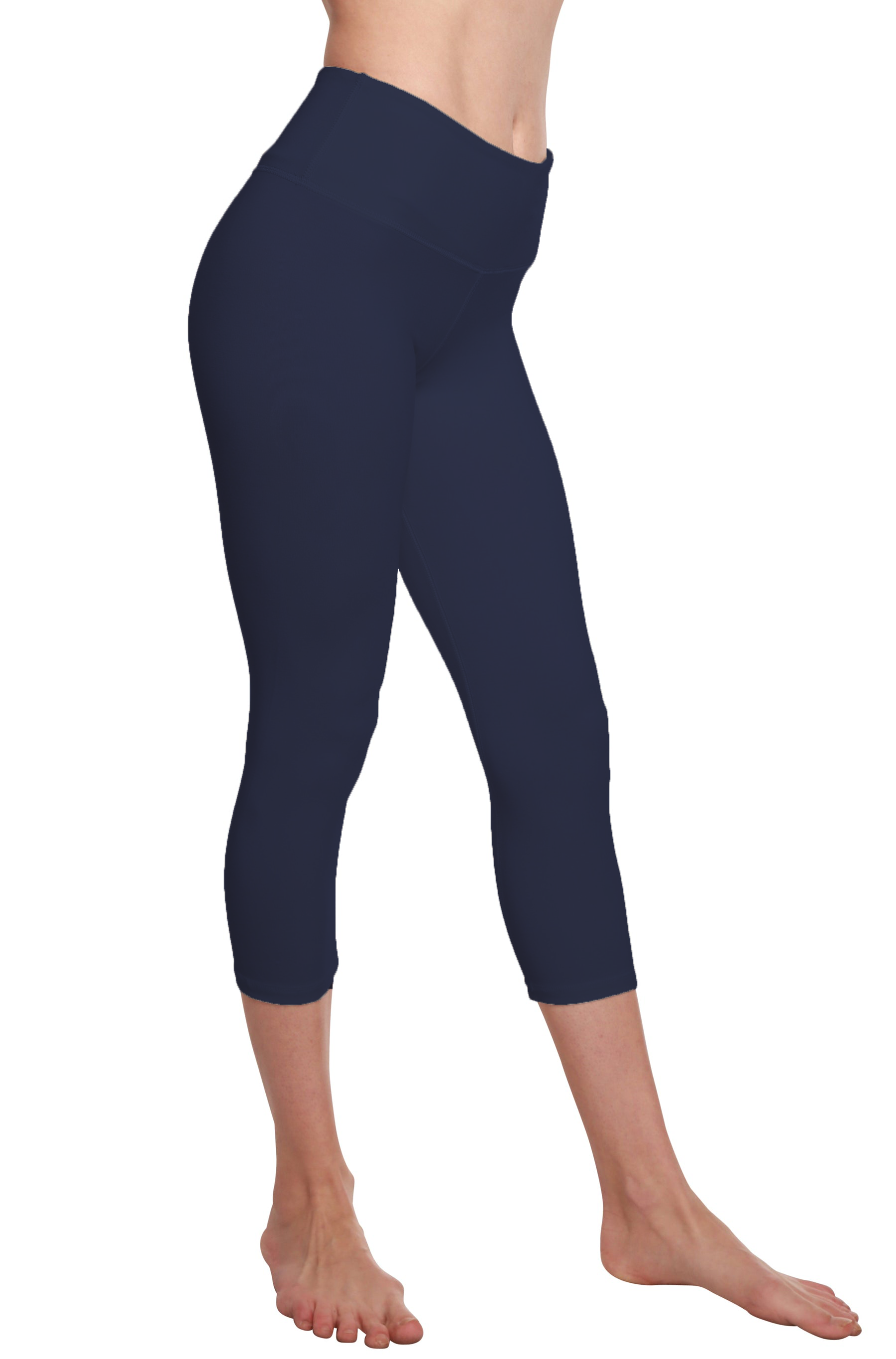 Navy blue capri leggings worn by a person on a white background